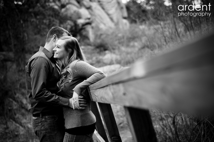love the use of the railing on this engagement shot